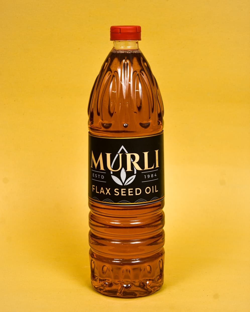 Murli Flax Seed Oil bottle, cold pressed organic cooking oil for healthy Indian meals